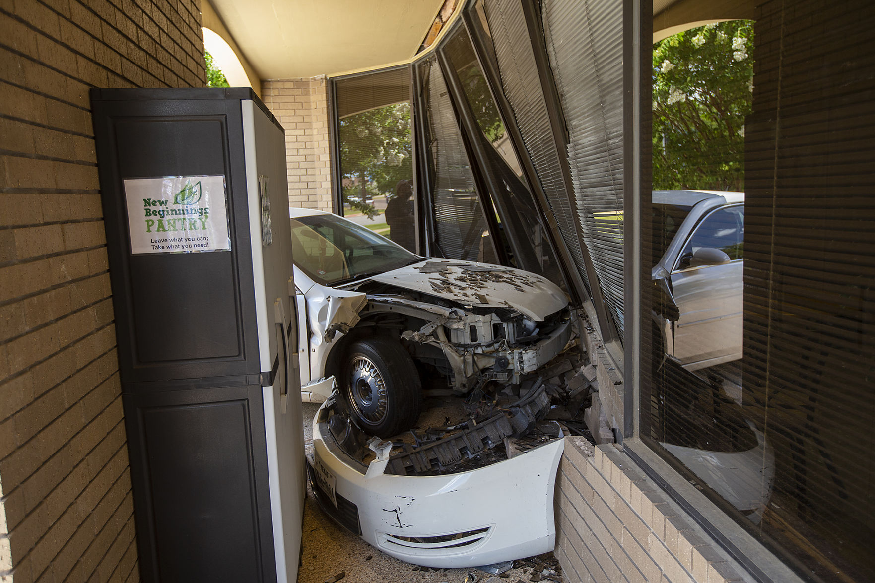 Car crashes into Bryan church, injuring driver